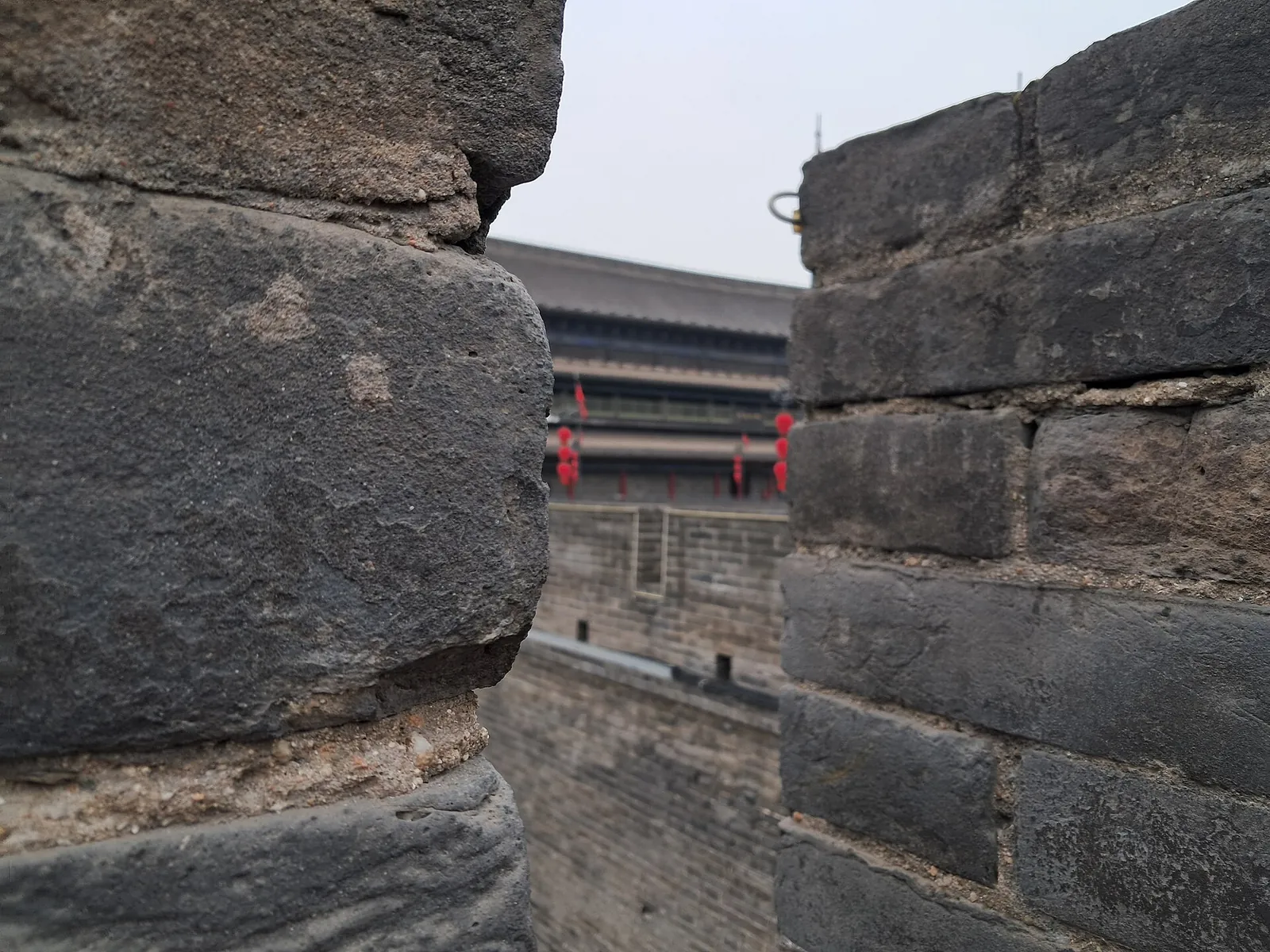 The Ming-era city wall of Xi'an with its ramparts under an open sky.